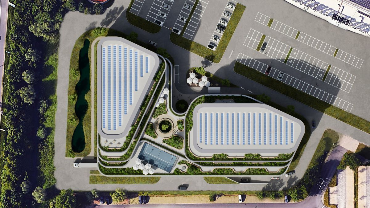 The proposal seen straight from above, with solar panels on both roofs, planted terraces, a body of water and the garden between the volumes